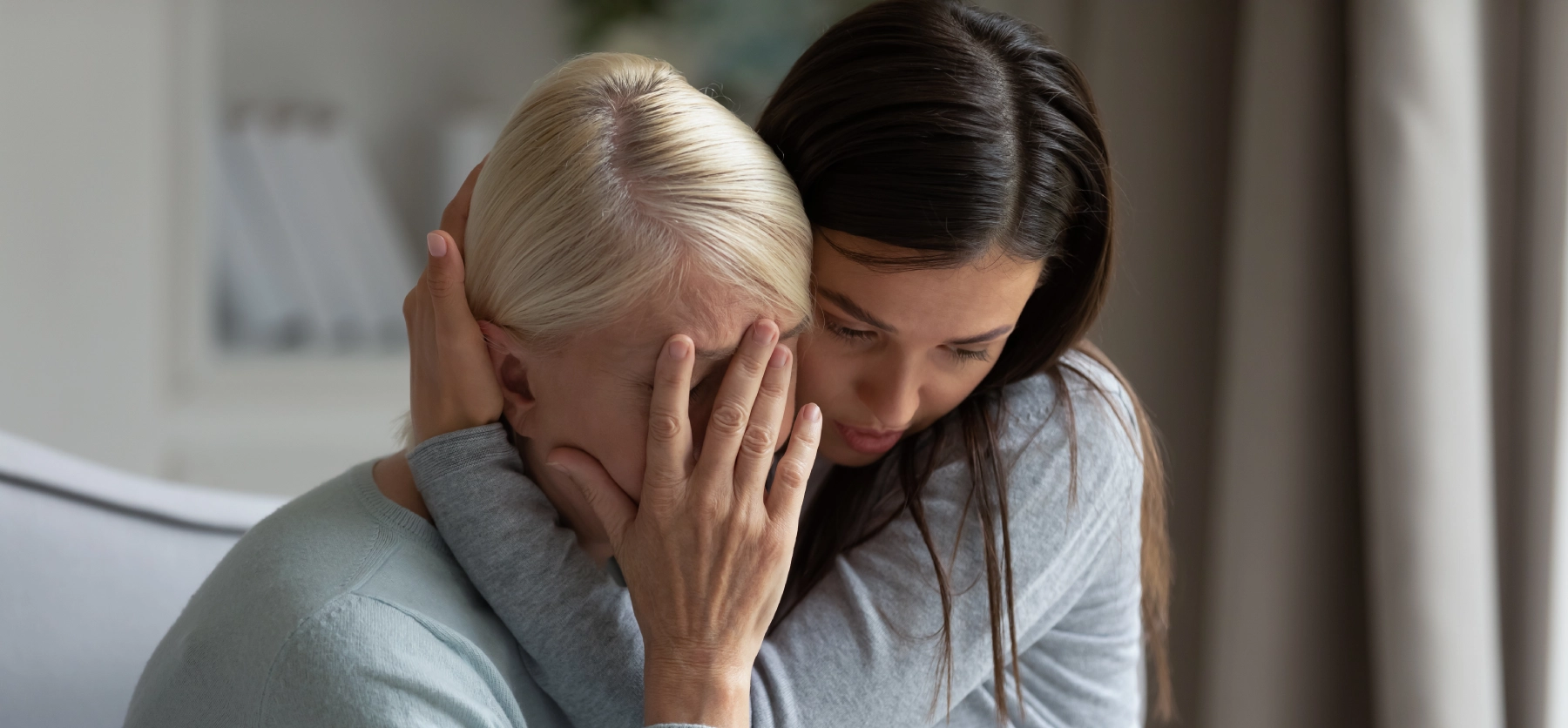 Mom and daughter holding each other because of a las vegas wrongful death